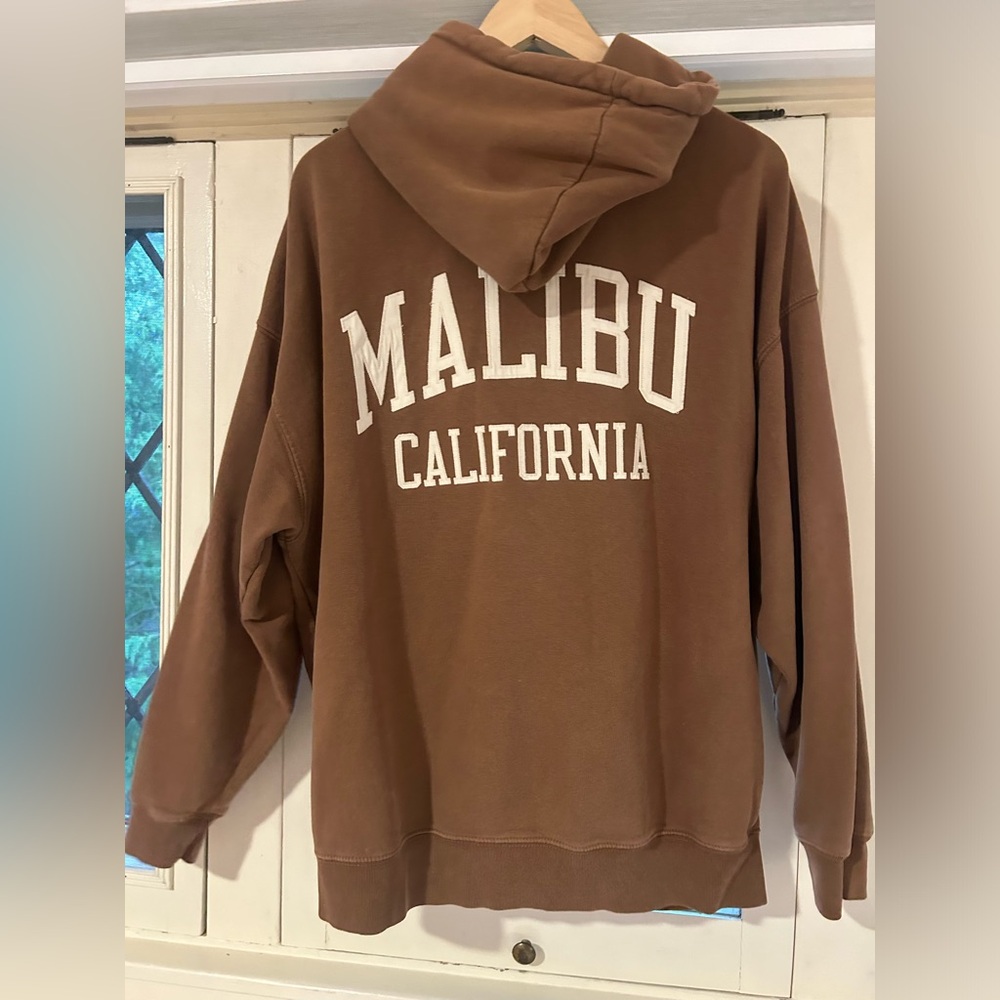 John Galt, Malibu, brown zip-up hoodie.